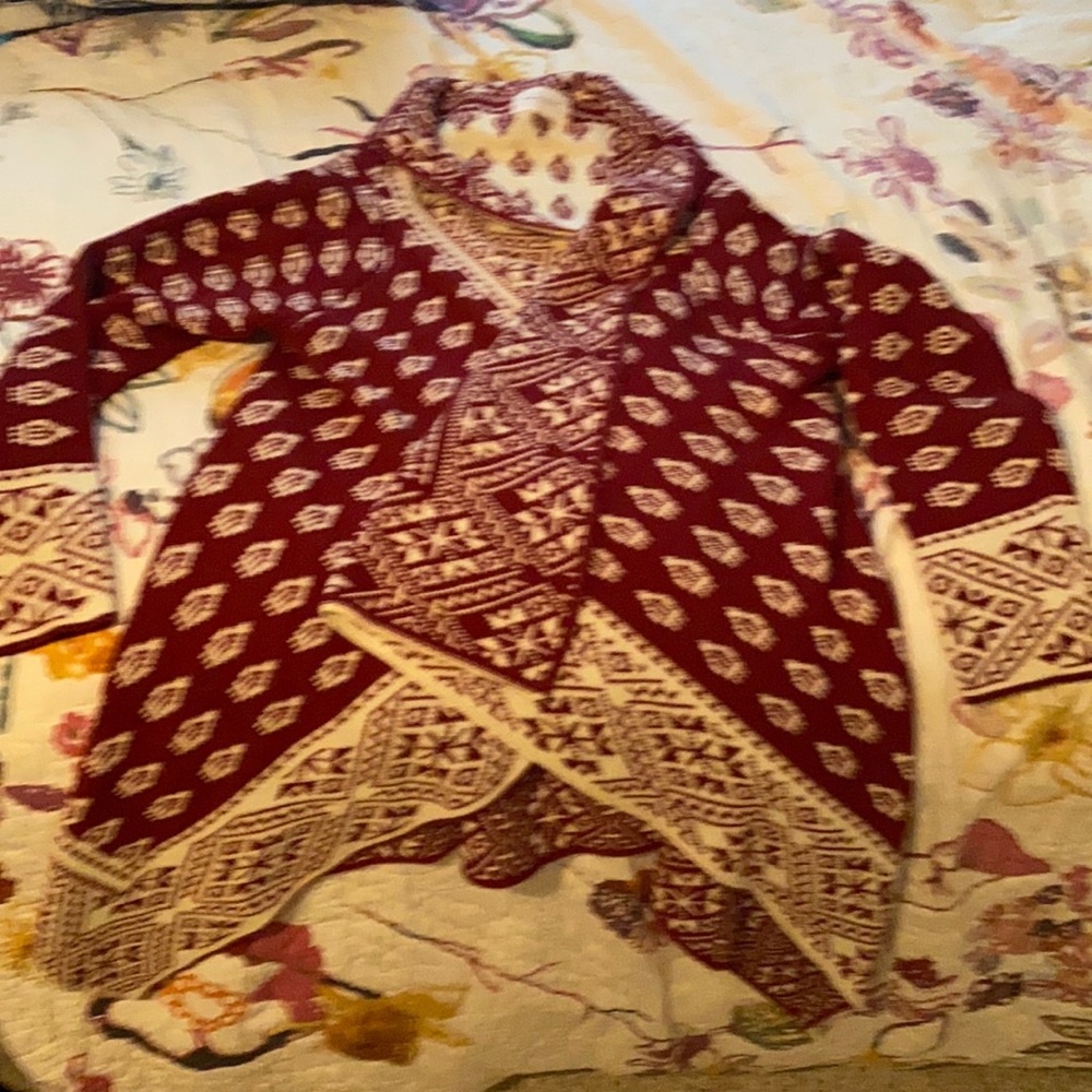 Knit winter sweater red and cream has sleeves but fits more like a shawl